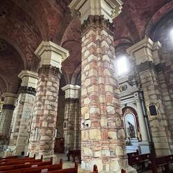 Cathedral in the town was built in 1634. Pillars of rock with Corinthian columns were handsome.