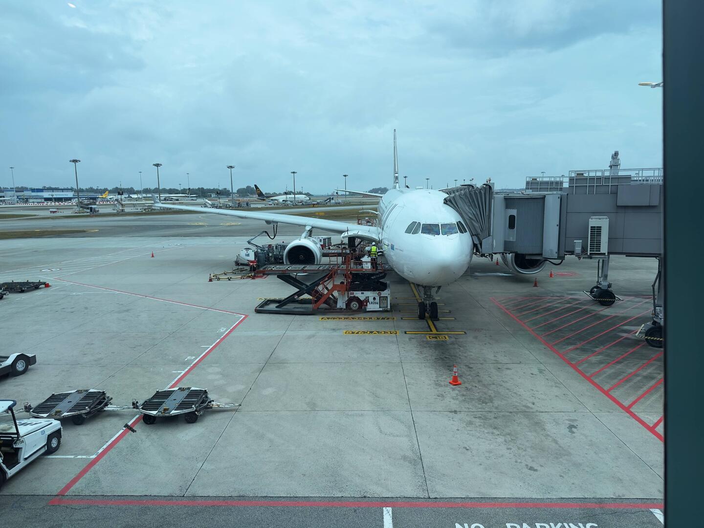 DQ-FJT (Island of Taveuni) at the gate in SIN awaiting its return to homebase as FJ362.