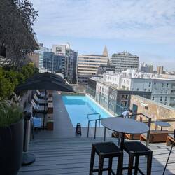 A small pool on the roof of the hotel