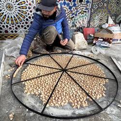 Making a mosaic. The pattern is faced down.