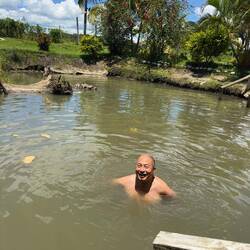 Rinsing off in the mud pool.