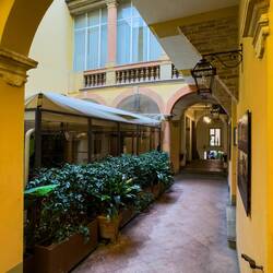Corte Isolani is the ground floor passageway at the palazzo — Palazzo Bolognini Isolani — Bologna.