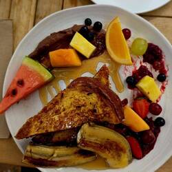 Colorful plate of French toast & fixin's