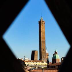 Can't resist sharing the amazing views from the Via Farini terrace ... Due Torri thru the lattice.