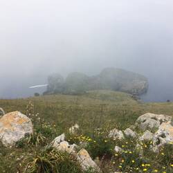 Blick aus der Wolke zum Meer