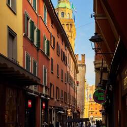 One of the side streets branching off from Piazza Maggiore — Bologna, Italy.