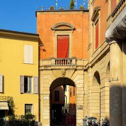 Shortcut to the old Jewish Quarter is through this arched gate — Bologna, Italy.