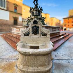 Potable water fountain near the Neptune Fountain — Bologna, Italy.
