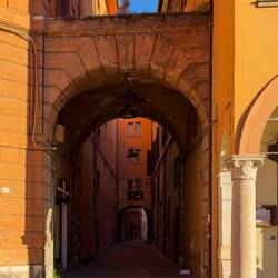 Streetscape near Estense Castle — Ferrara, Italy.