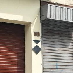 Black triangles and white denote UNESCO protected building