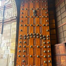 Doors were very tall, so people on horses could stay on their horses and knock