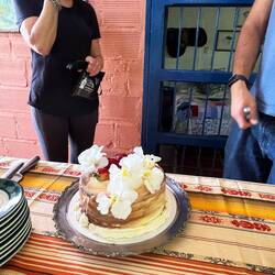 One of our group turned 70 today so we celebrated with a delicious cake covered with orchids.