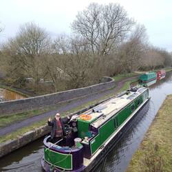 Passing over Poole Aqueduct. Notice the difference in water colour between the Macc and T&M below