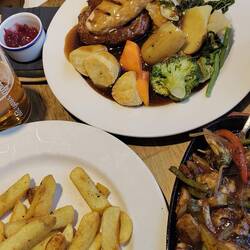 Will's Sunday lunch with plant based 'chicken' and Vicky's vegetable sizzler with black bean sauce