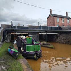 Delay at the last lock where the bridge was too low to keep Little Rainboat on the roof