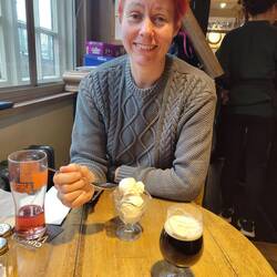 Happy lady with vegan ice cream dessert