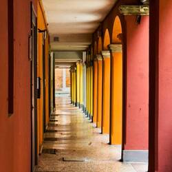 I just love the colorful porticos — Bologna, Italy.