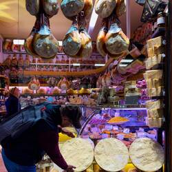 I think Mui's trying to figure out if he can get this wheel of cheese in his carry-on bag 😄