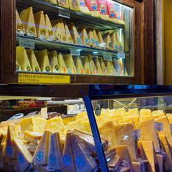 Via Pecherie Vecchie — Wedges of Parmigiano-Reggiano ... aged for many months ... up to 100.
