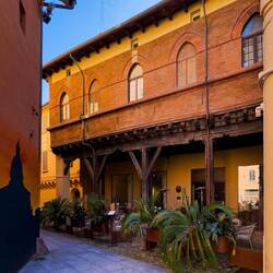 The city's only remaining portico made of wood — Bologna, Italy.