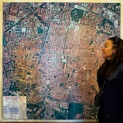 Stella giving us the lay of the land on a map ... Palazzo d'Accursio — Bologna, Italy.