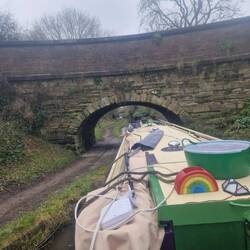 Squeezing under a bridge with Rainboat's chimney up.