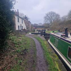 Hall Green stop lock. 1ft rise. A brick and a stone keeper's cottage, one from each canal company.