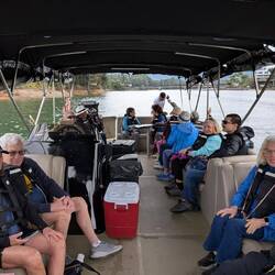 Our pontoon boat. Marcia is behind the driver on the left