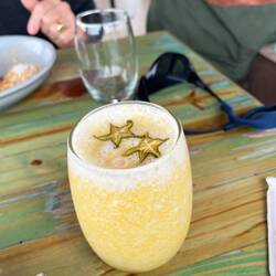 Lulo -- a refreshing drink made from the local lulo fruit, lime juicelime juice, and a little sugar.