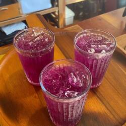 A warm welcome with a refreshing Butterfly Pea Lemonade. The perfect cool drink to start our stay.
