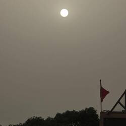 Dust in the air blocks the midday sun