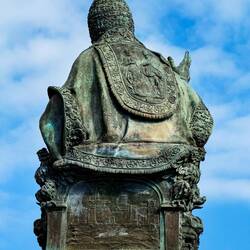 Intricately decorated bronze statue of Pope Paolo V Borghese — Rimini, Italy.
