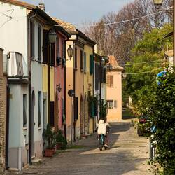 Colorful side street on our way to the Bridge of Tiberius — Rimini, Italy.