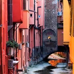 The Window on the Canal ... on the wall of the brick building — Bologna, Italy.