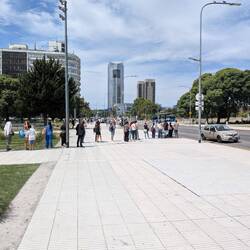 Instead of everyone crowding around the bus stop, they line up in a single file line it's unbelievab