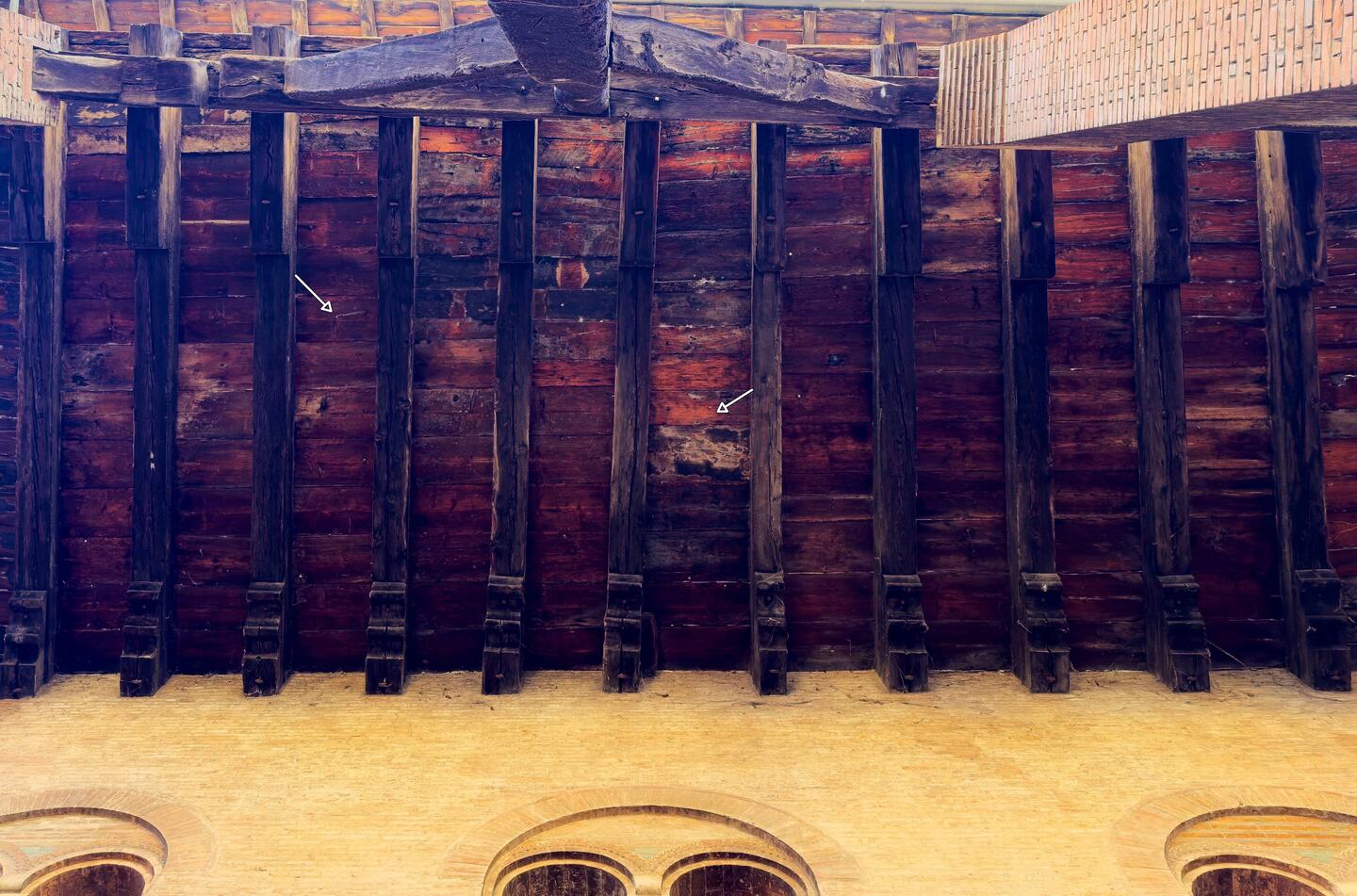 The white arrows point to what I think are two of the three arrows — Bologna, Italy.