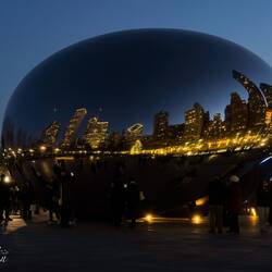 The Bean beautifully reflects the night skyline — Chicago, Illinois.