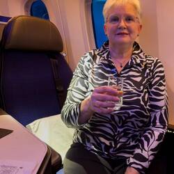 Toasting the start of our flight with a glass of bubbly @ DEN — Denver, Colorado.