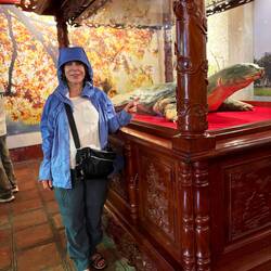 Jane with preserved giant turtle - only 6 remain anywhere