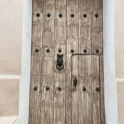 An owl indicates the home of a professor or learned person