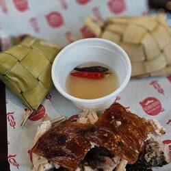 Spanferkel mit Reis und Essig-Chili.