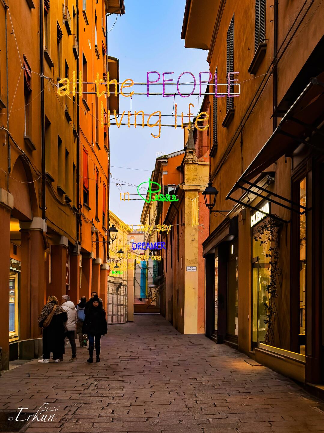 Inspirational words in lights ... on one of the streets branching off Piazza Maggiore — Bologna.