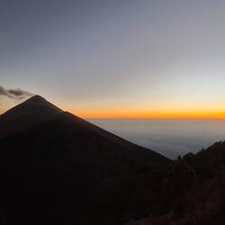 Sunset above the clouds