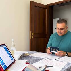 Working on Modulo I of the residence permit application — Bologna, Italy.