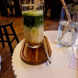 Iced mango matcha latte