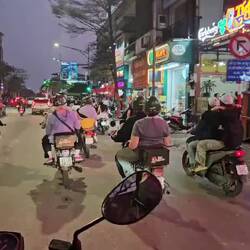 Scooting around Hanoi. I'm in the grey shirt on the right