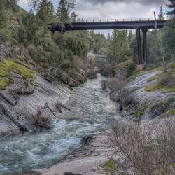 I'm parked up by the bridge