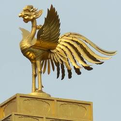 A Phoenix rising from the ashes on top.