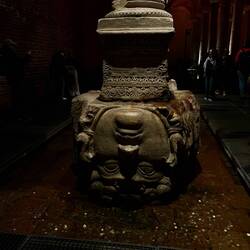 Medusa's head carved in the bottom of a piller in the Basilica Cistern