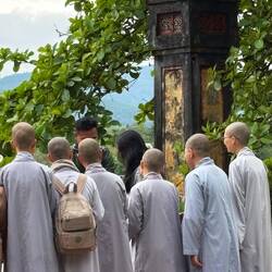 Nuns taking a photo at the pagoda